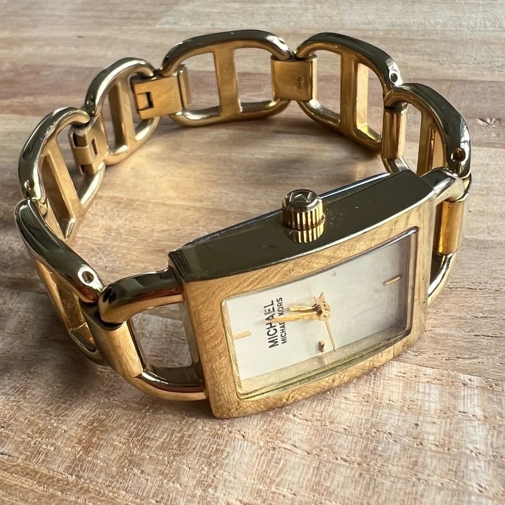 Michael Kors ladies rectangular gold tone bracelet dress watch NEW BATTERY